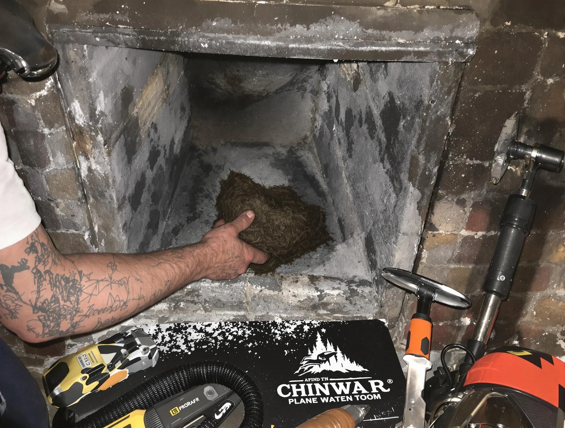 Parsippany-Troy Hills Chimney Sweep safely removing debris and screening chimney in Parsippany-Troy Hills, NJ